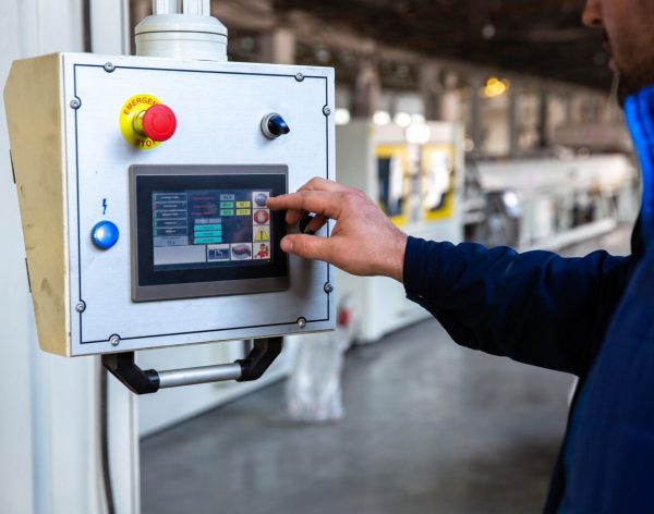 worker-uses-control-panel-factory_140725-7625